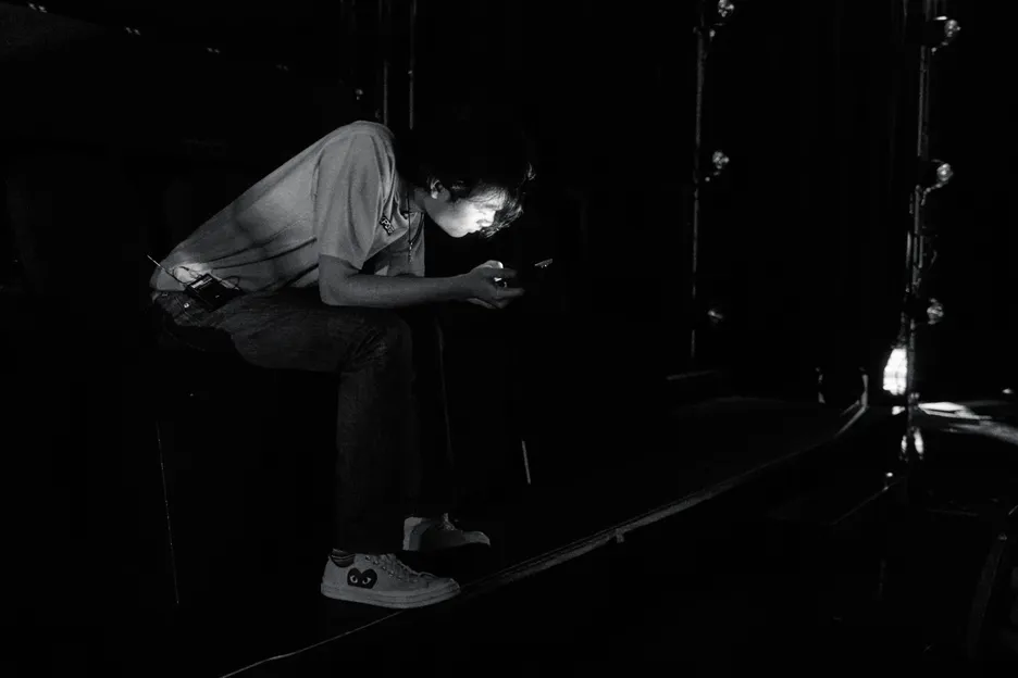David Dongwoo Ko finds a light source during the power outage. 