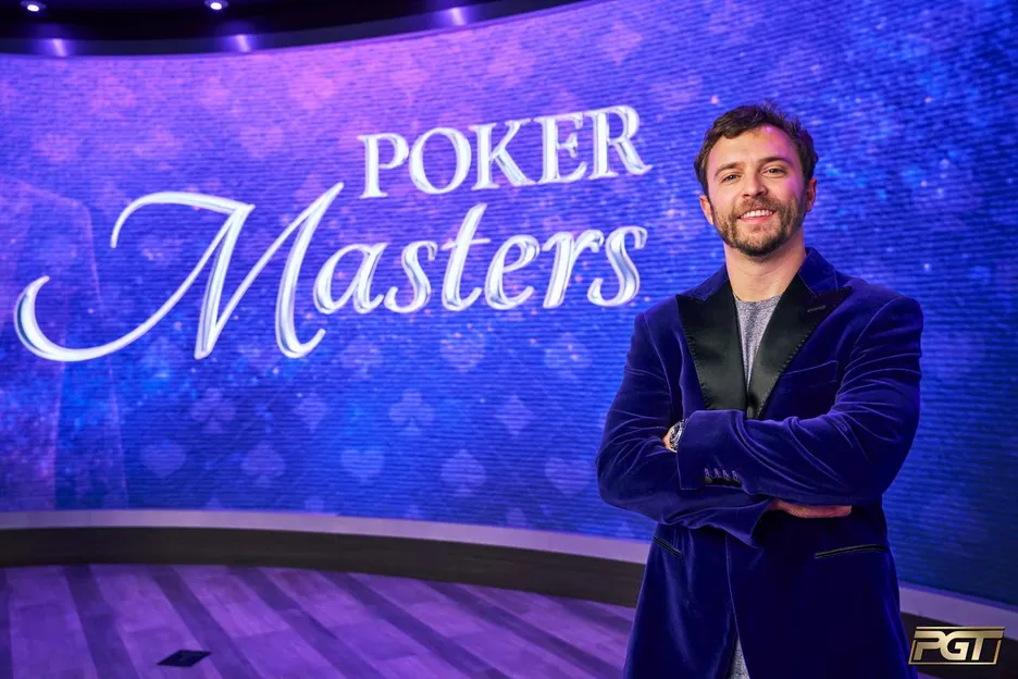 David Coleman poses in the purple jacket he won for winning the 2025 poker masters. credit PokerGO