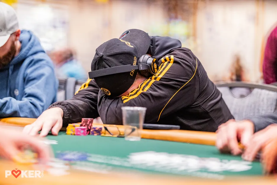 It was a head-in-arms type of day for Hellmuth in the $50K PLO High Roller. 