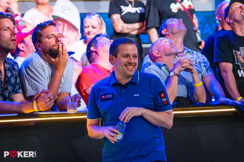 Kenny Hallaert is hanging on tight after losing a big pot to Mizrachi at the end of the day. 