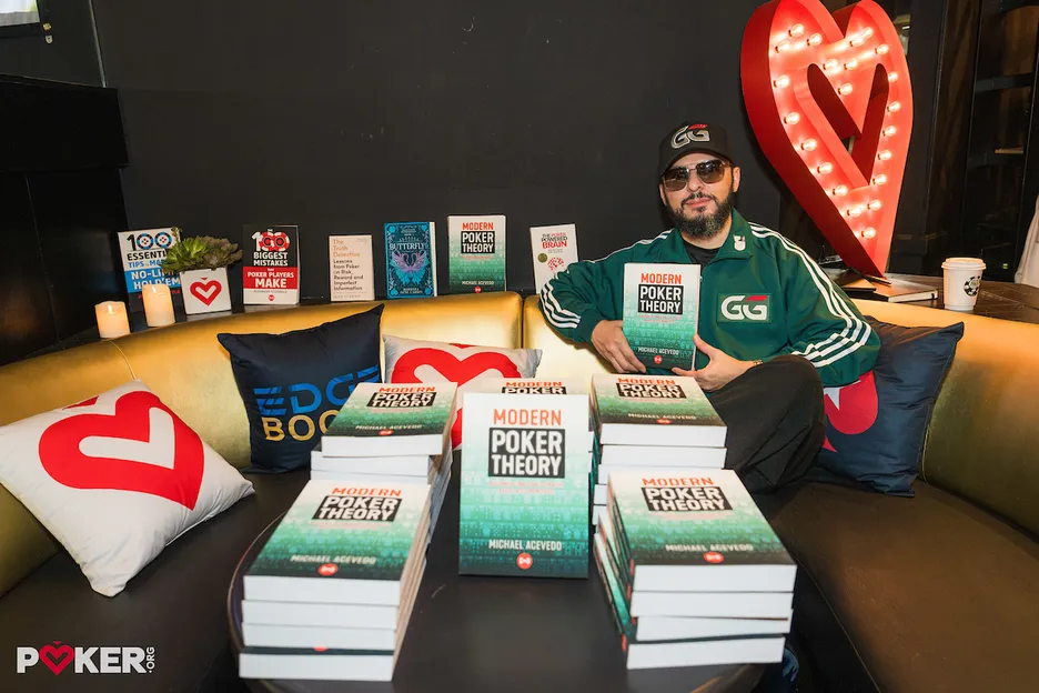 Michael Acevedo, doing a little light reading in the PokerOrg Legends Lounge.