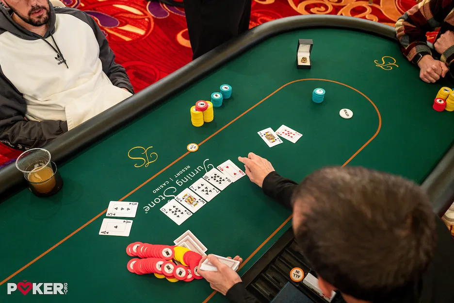 The final card is dealt, securing Grupp's victory.
