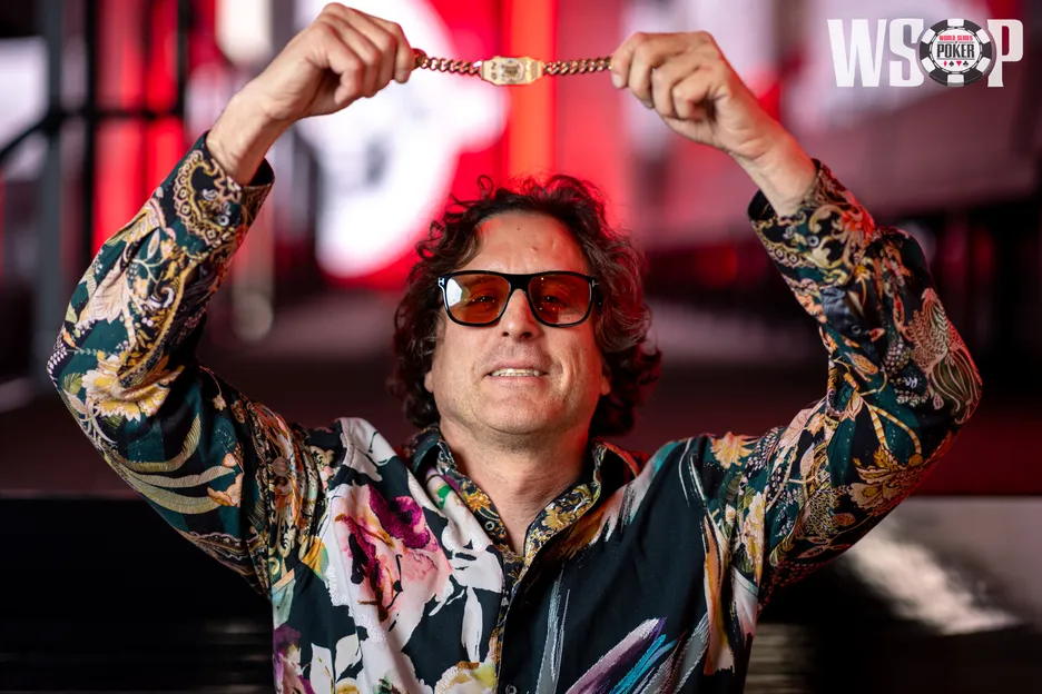 Michael Casella proudly poses with his first WSOP bracelet