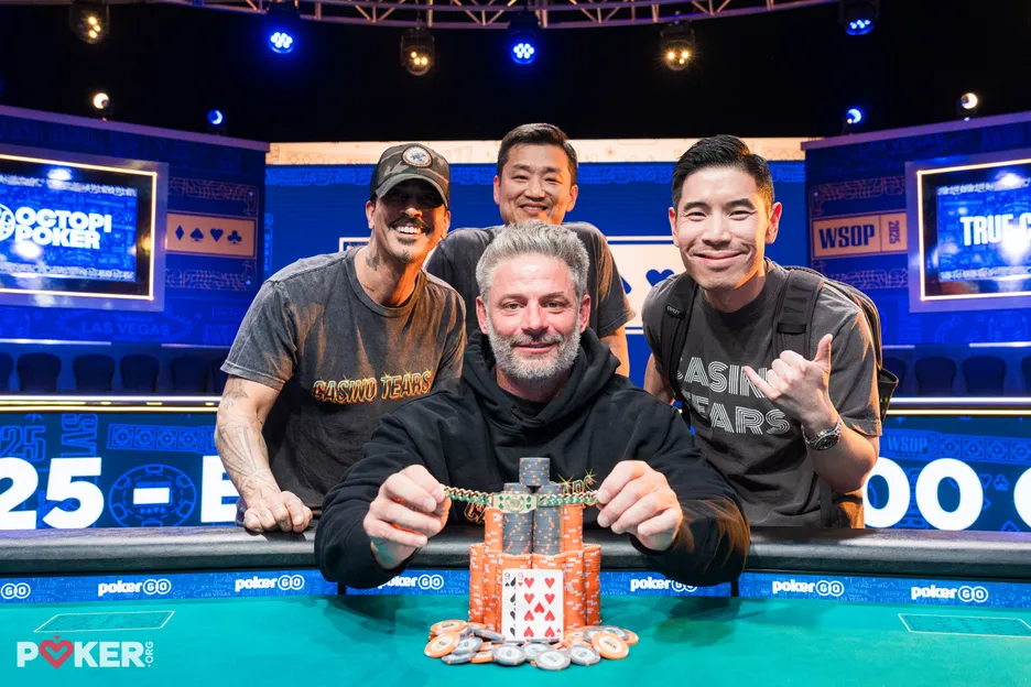 Courtenay Williams celebrates his bracelet wiun with his friends.