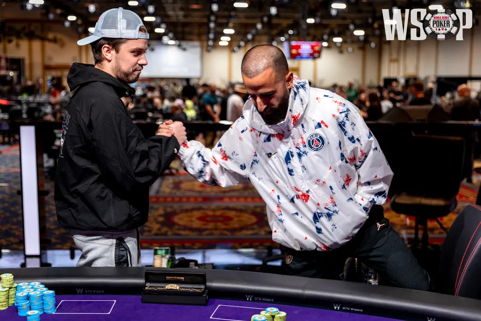 Frederic Normand and Michael Rodrigues shake hands after their one-hand heads up match