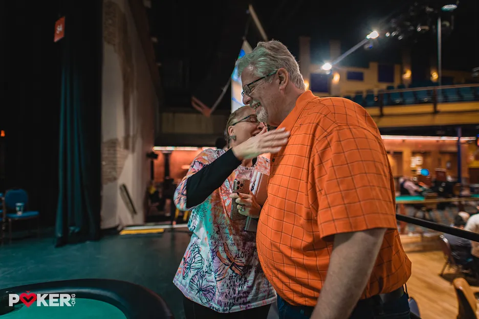 Yount's wife Betsy celebrates with him after the final card was dealt