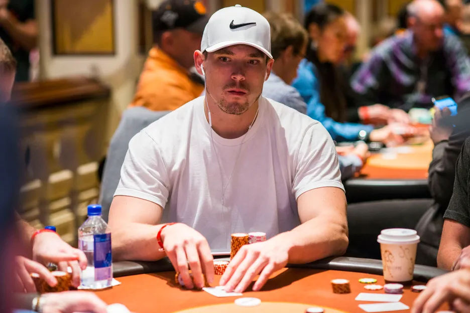 Alex Foxen studies the board during the WPT Five Diamond World Poker Classic in 2017, by Joe Giron