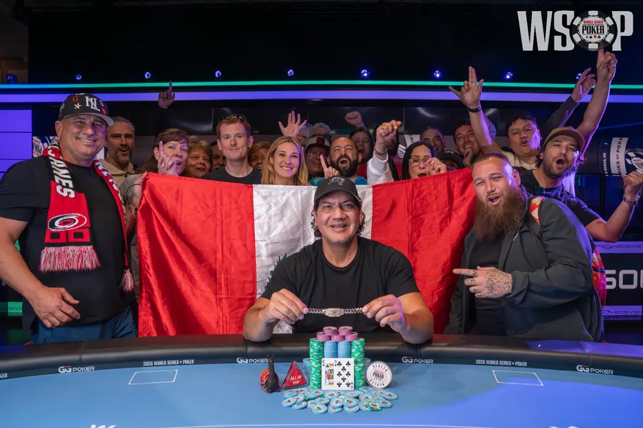 Juan Rodriguez and his rail celebrate his first WSOP bracelet.