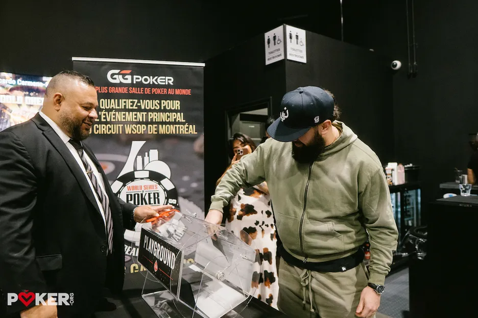 Ricardo Cermano-Sandoval reaches into the Mystery Bounty Gold Chest