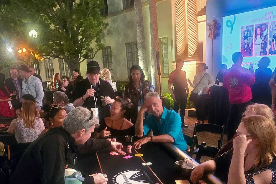 PokerOrg's Craig Tapscott (blue shirt) was the lone man at a final table of seven women. He finished third in the charity event.