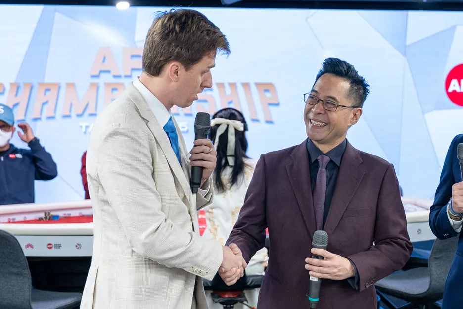 Fred Leung, right, was joined by commentator and player Henry Kilbane to announce the final prizepool to the room.