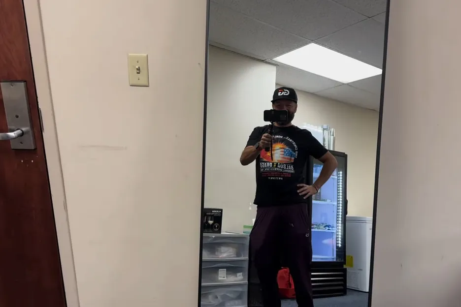 Daniel Negreanu and the new full-length mirror in his VIP break room. 
