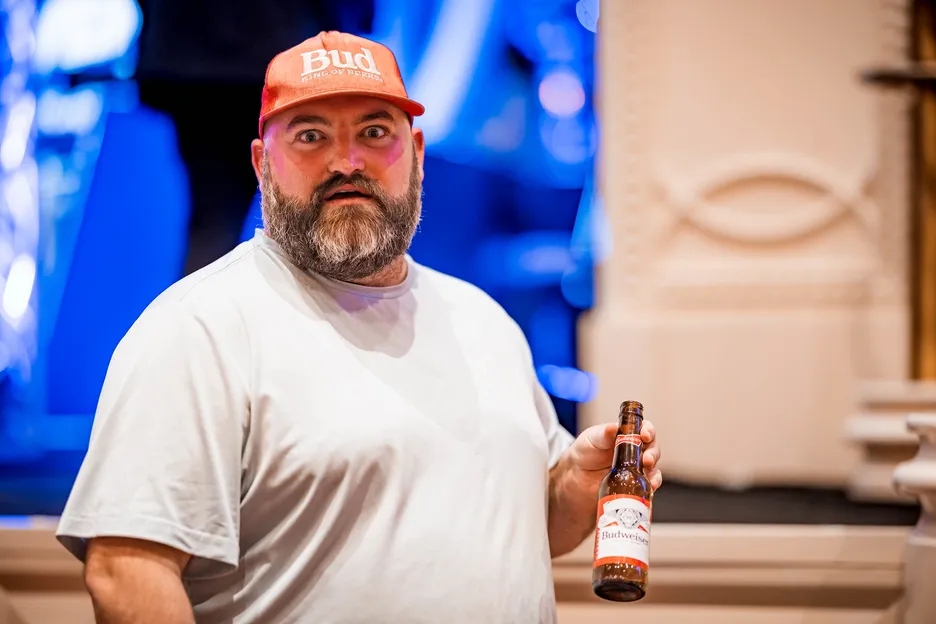Scott Stewart poses with an empty Bud on his way to the final two tables of the WPT World Championship