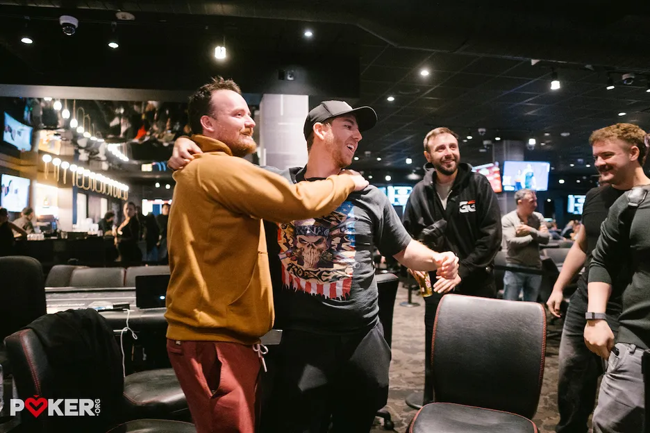 The champion celebrates with his friends