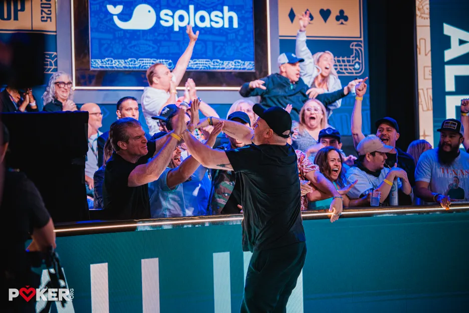 Michael Mizrachi finds a huge double and celebrates with his rail. 