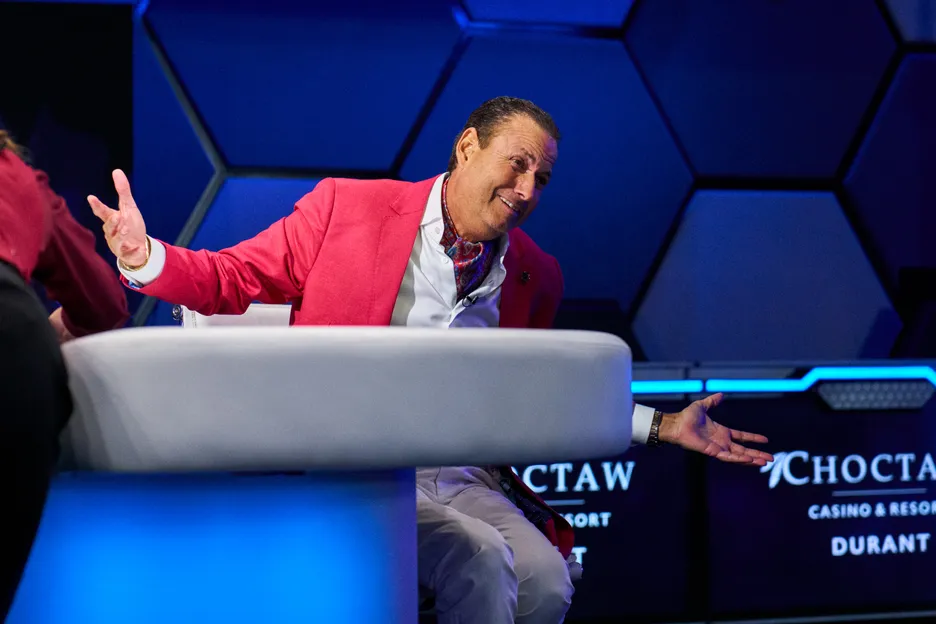 Runner-up Eric Afriat doing a Phil Hellmuth thing with his hands. 