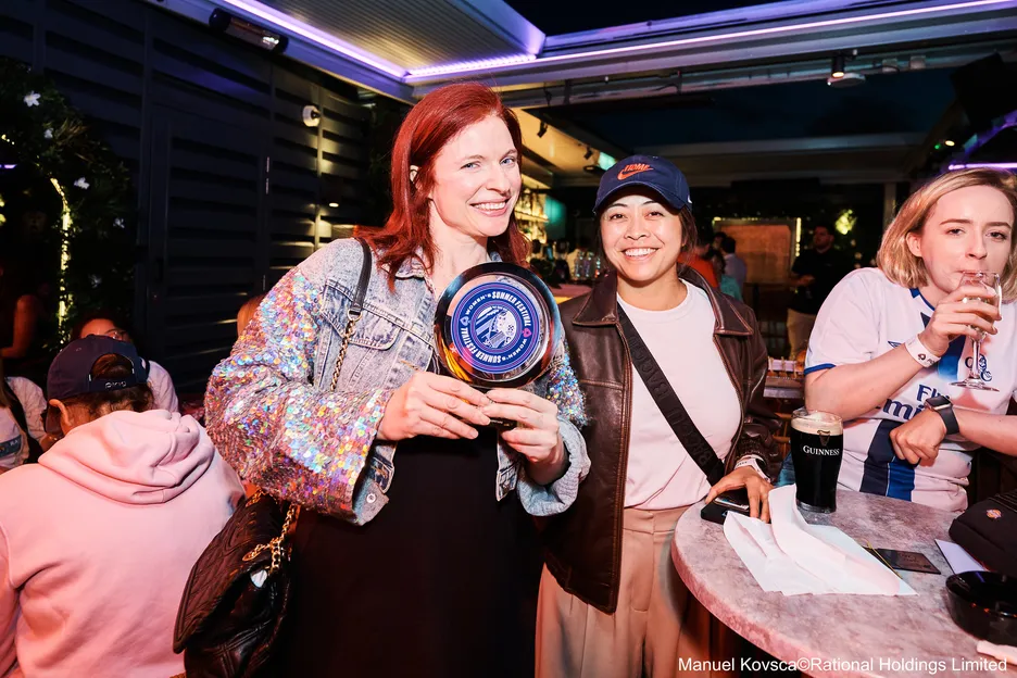 Shahade with her latest hardware at the festival's closing party. credit MANUEL KOVSCA