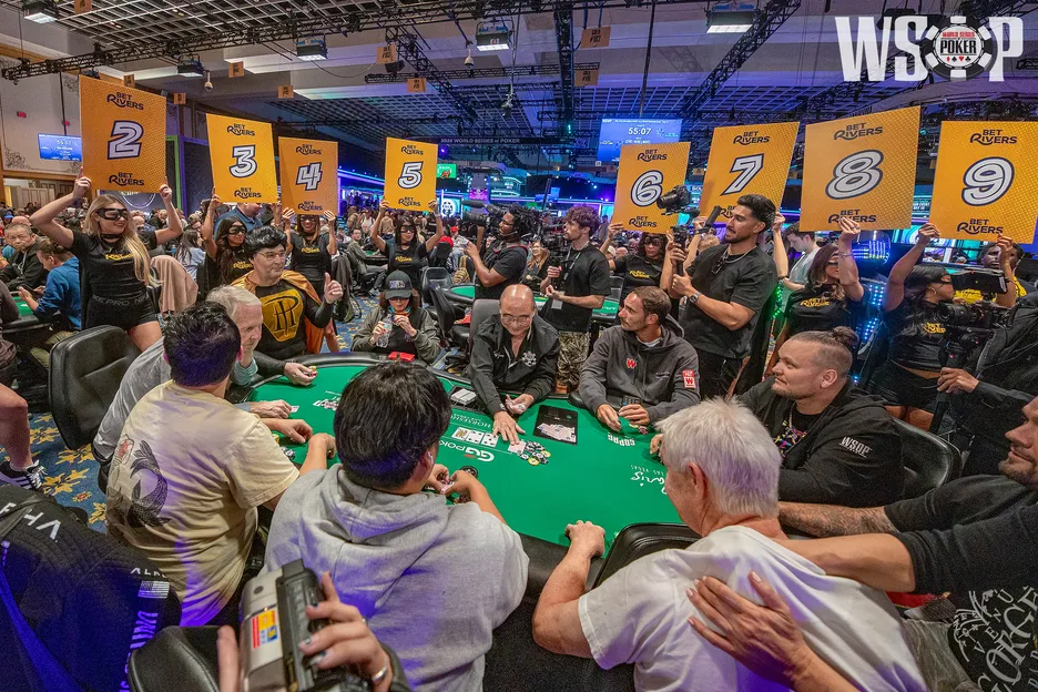 Teibloom tries to play a hand as Hellmuth enters